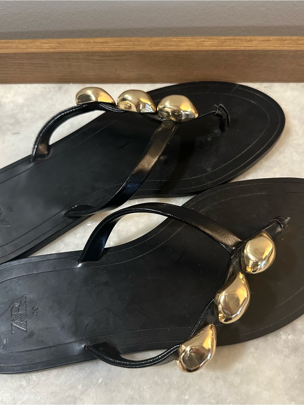 Zara Black Flip Flop Sandals with Gold Accent